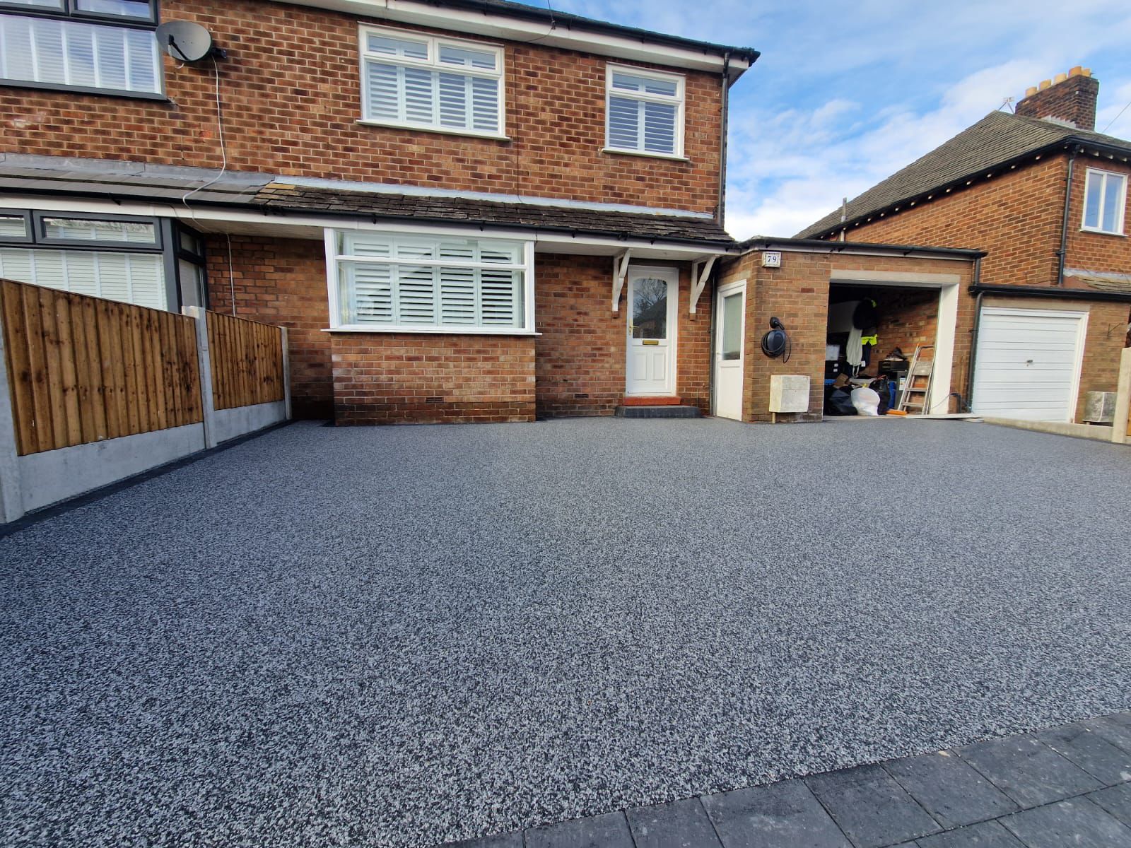 New resin surfacing transforming a front driveway in Manchester