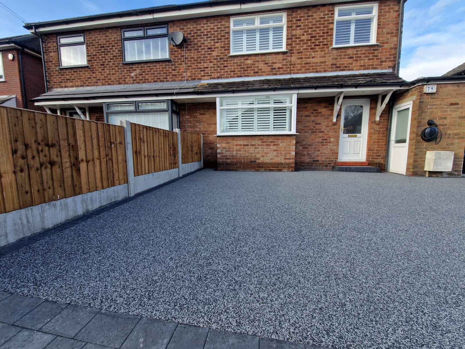 Smooth seamless resin drive finished by L&R Surfacing in Manchester